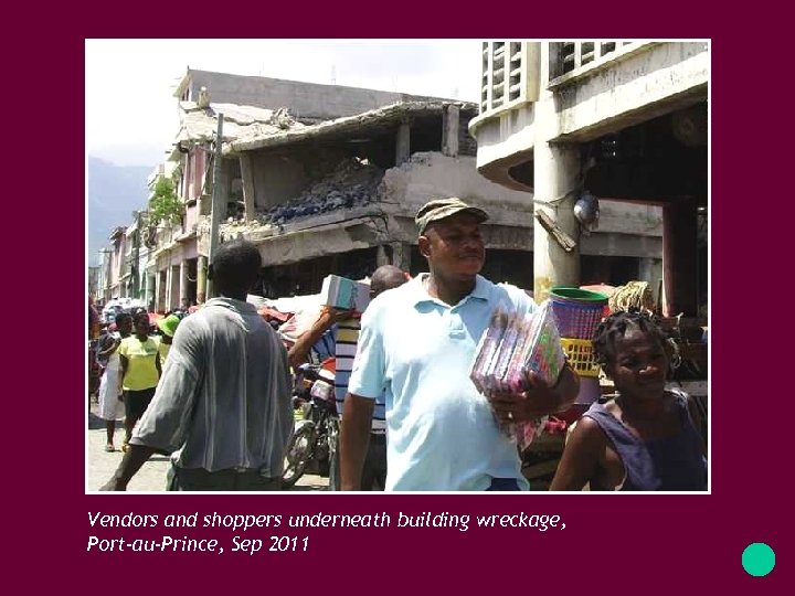 Vendors and shoppers underneath building wreckage, Port-au-Prince, Sep 2011 