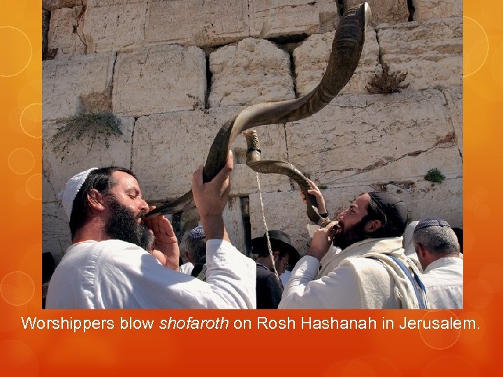Worshippers blow shofaroth on Rosh Hashanah in Jerusalem. 