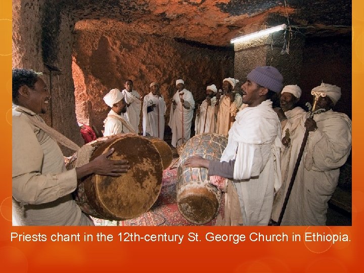 Priests chant in the 12 th-century St. George Church in Ethiopia. 