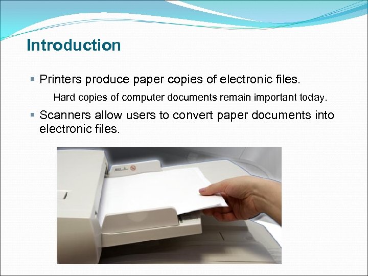 Introduction § Printers produce paper copies of electronic files. Hard copies of computer documents