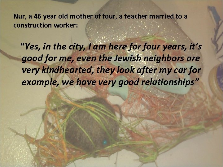 Nur, a 46 year old mother of four, a teacher married to a construction