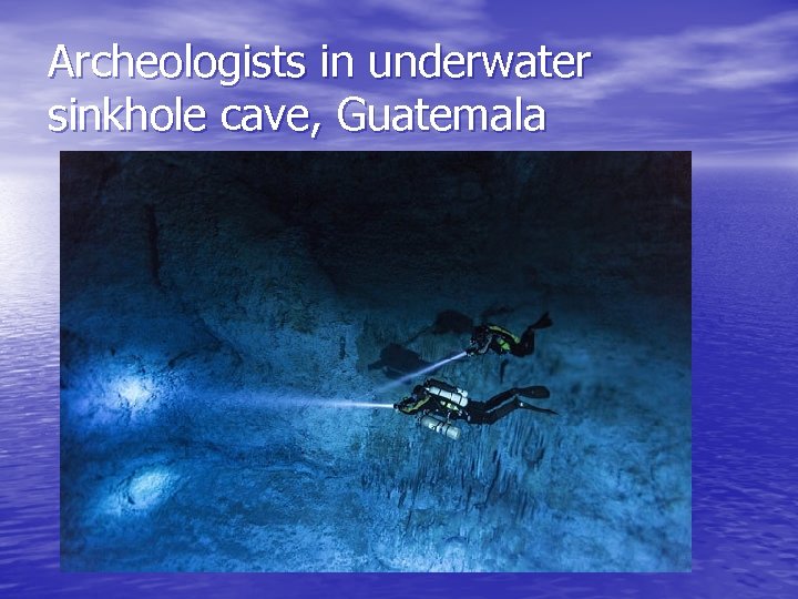 Archeologists in underwater sinkhole cave, Guatemala 