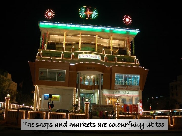 The shops and markets are colourfully lit too 