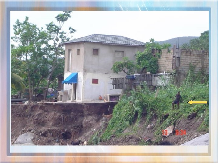 House undermined by river. 50 feet of backyard gone 