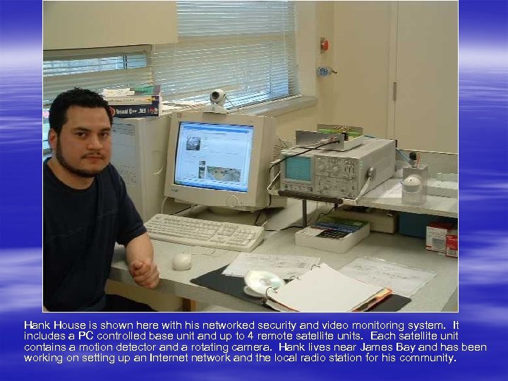 Hank House is shown here with his networked security and video monitoring system. It