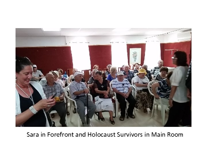 Sara in Forefront and Holocaust Survivors in Main Room 