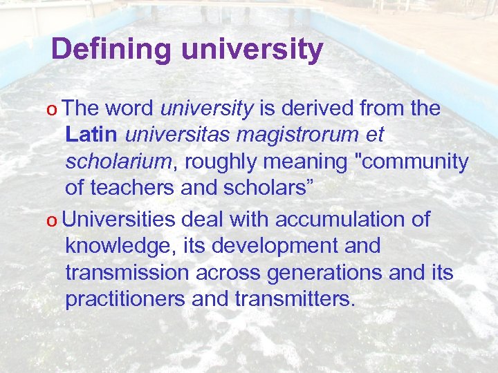 Defining university The word university is derived from the Latin universitas magistrorum et scholarium,