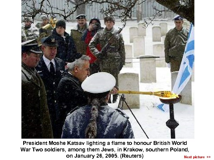 President Moshe Katsav lighting a flame to honour British World War Two soldiers, among