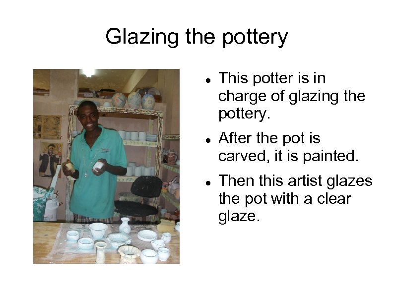 Glazing the pottery This potter is in charge of glazing the pottery. After the