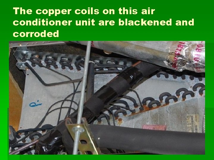 The copper coils on this air conditioner unit are blackened and corroded 