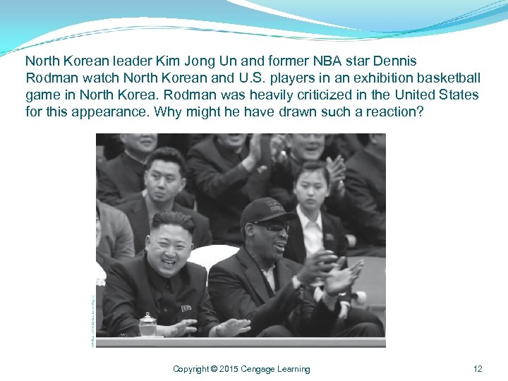 North Korean leader Kim Jong Un and former NBA star Dennis Rodman watch North