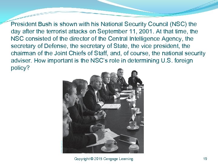 President Bush is shown with his National Security Council (NSC) the day after the